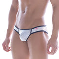 MetroMaleWear fishnet bikini briefs in white mesh with black trim and a red logo on the waistband
