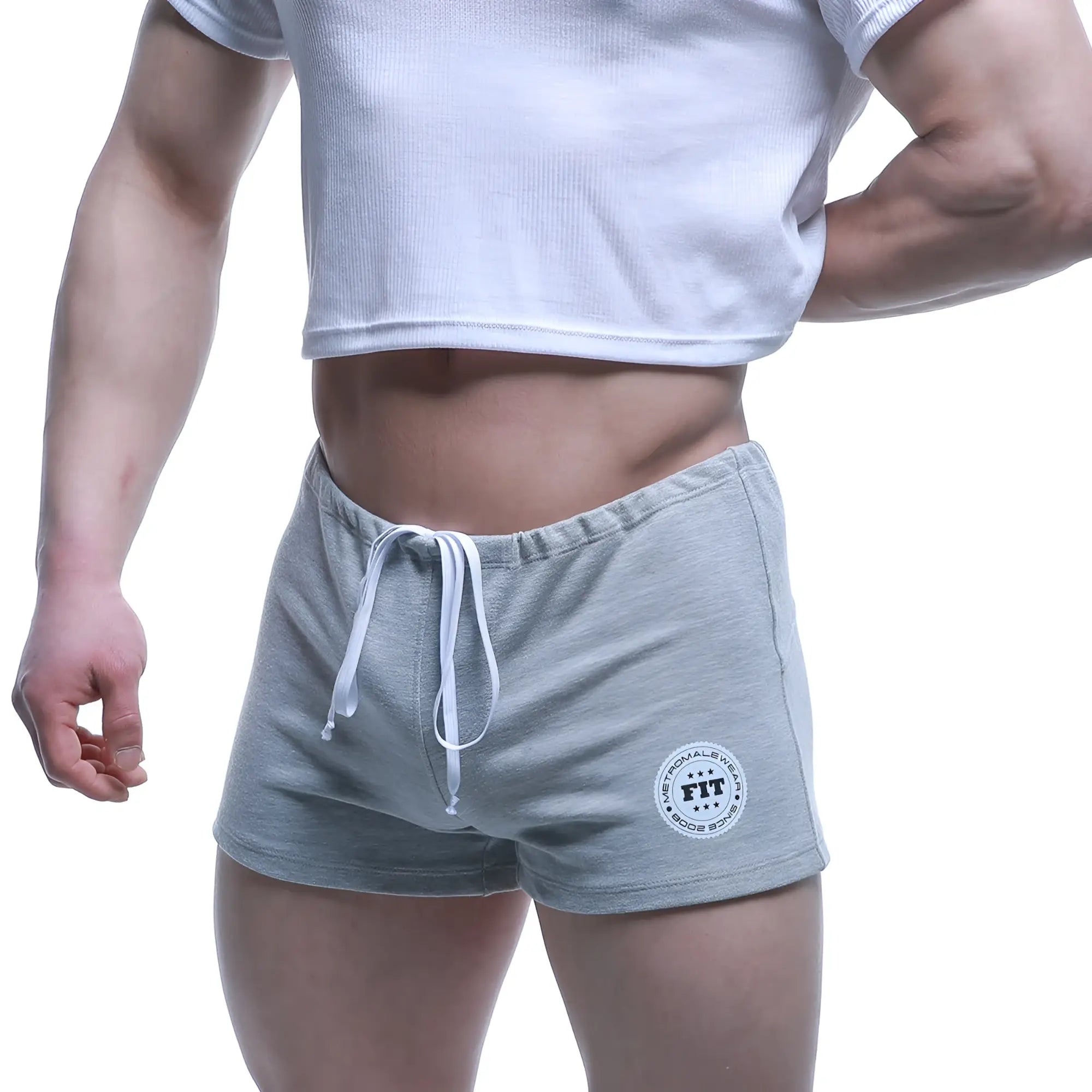 Gray heathered MetroMaleWear fit shorts with white drawstring and circular logo patch on lower left leg