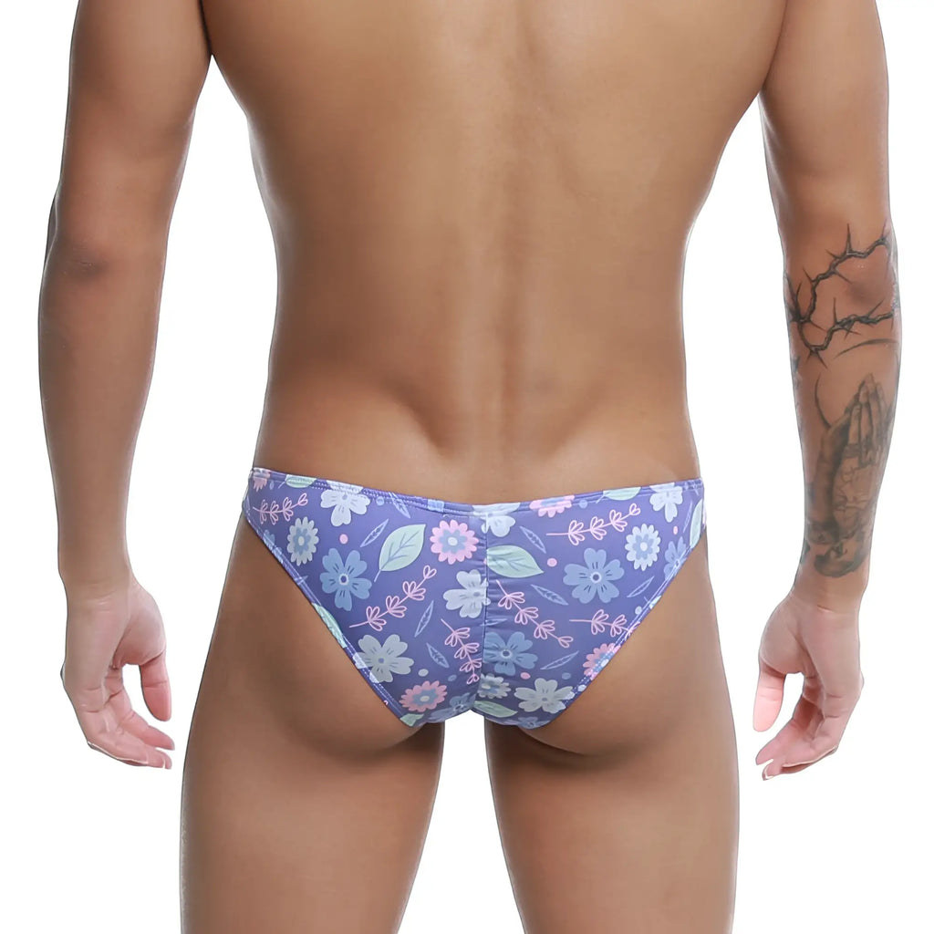 Purple floral-patterned MetroMaleWear Fits Bikini Jardin 6603-44 men’s briefs with blue pink and white flowers and leaves