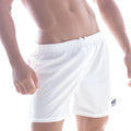 White athletic shorts with elastic waistband and small logo patch on the lower right leg metro malewear flexible swim trunk