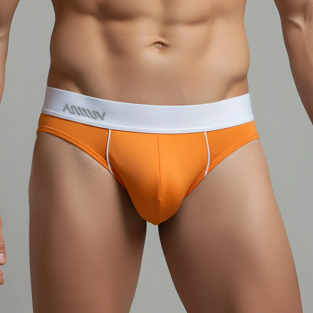 Orange metro malewear flow brief 6113-14 featuring men’s briefs with white kolly waistband and subtle side stitching