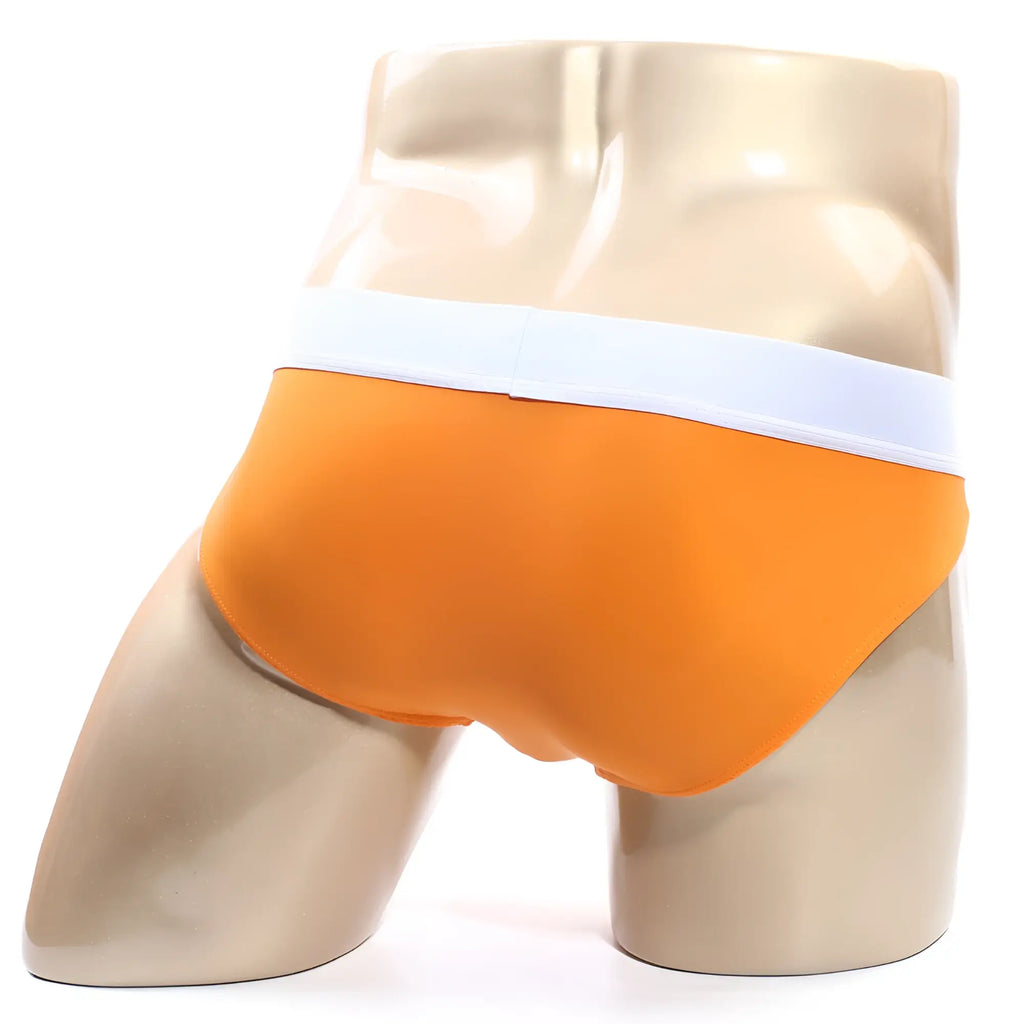 Orange briefs with a white waistband from metromalewear flow brief 6113-14 made of soft breathable fabric