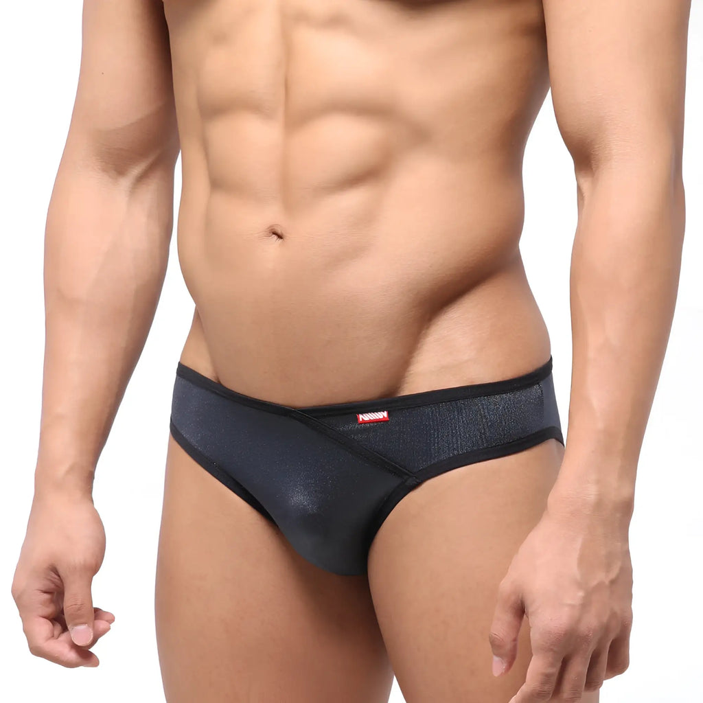 Black textured men’s briefs with subtle shimmer and red MetroMaleWear brand tag on waistband model 6107-20