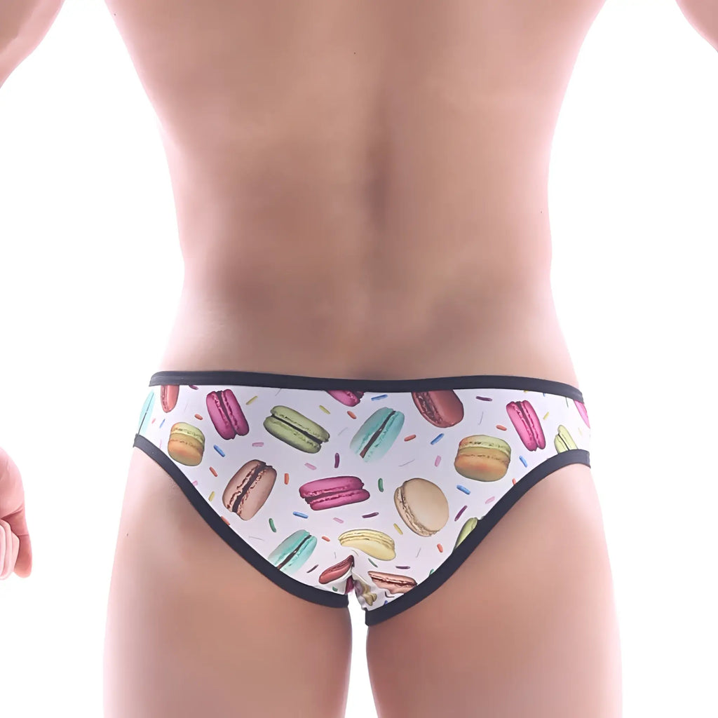 White briefs with playful pink green yellow and beige macaron pattern and black trim metro male wear focus brief