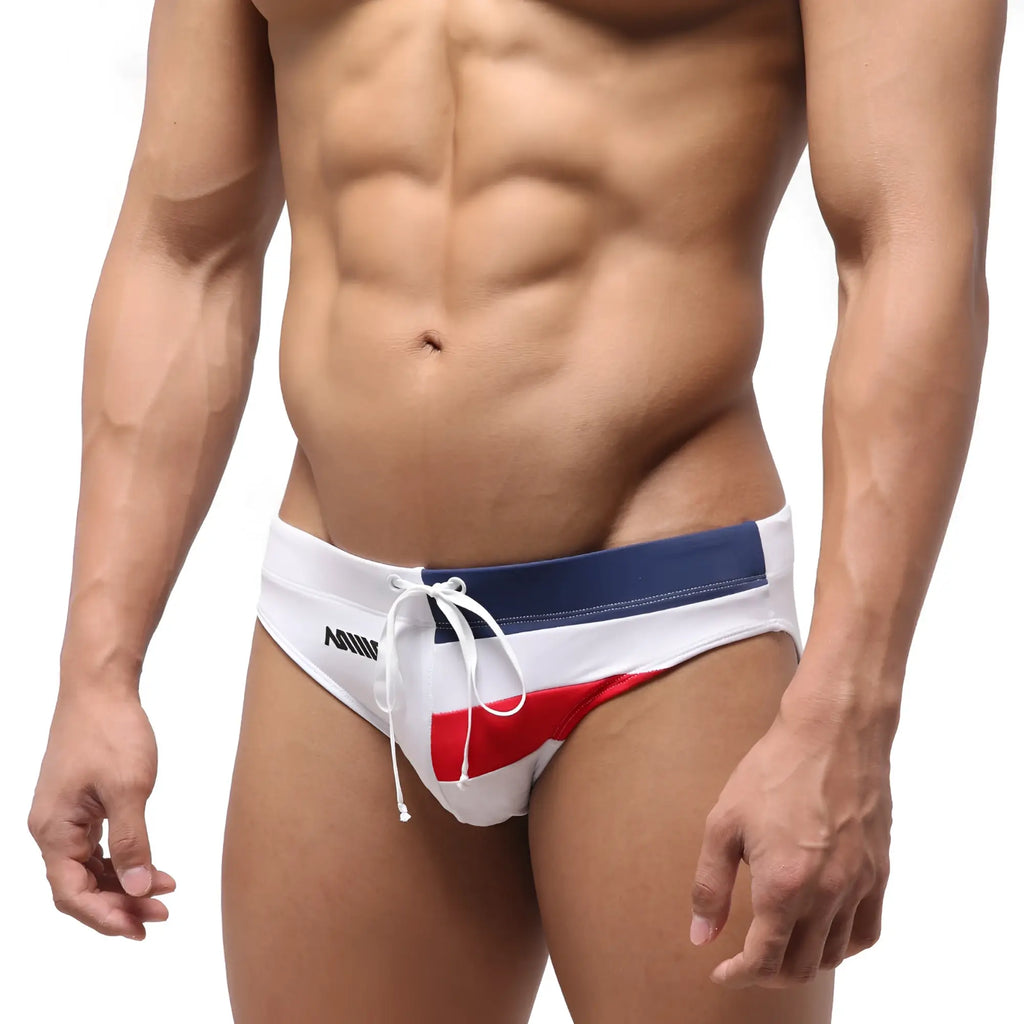White swim trunks with navy blue and red drawstring waistband and anna branding side logo from MetroMaleWear French Swim Brief 4946-32