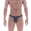 Navy blue metro male wear fria thong with a small red and white brand tag at the waistband