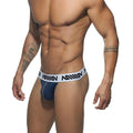 MetroMaleWear Genesis thong in dark blue denim briefs with a white elastic waistband and bold black lettering