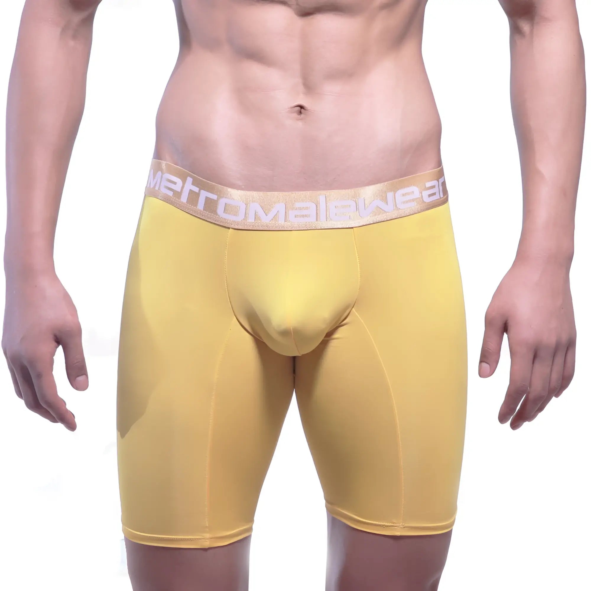 Yellow men’s compression briefs with light beige elastic waistband featuring metromale wear logo goldmine long short 15 inch