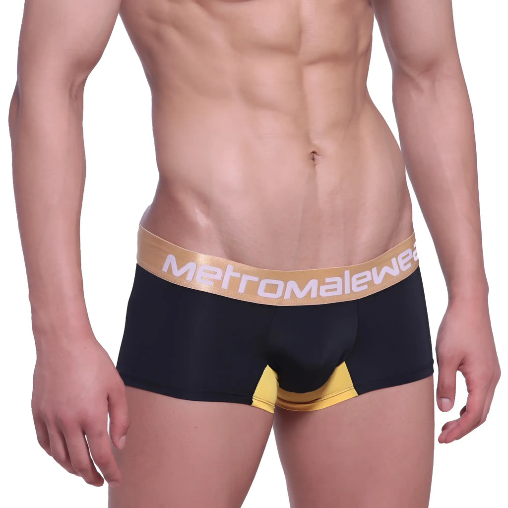 Black men’s briefs with a gold metromalewear waistband and yellow leg accents metroMalewear goldmine short boxer 7inch