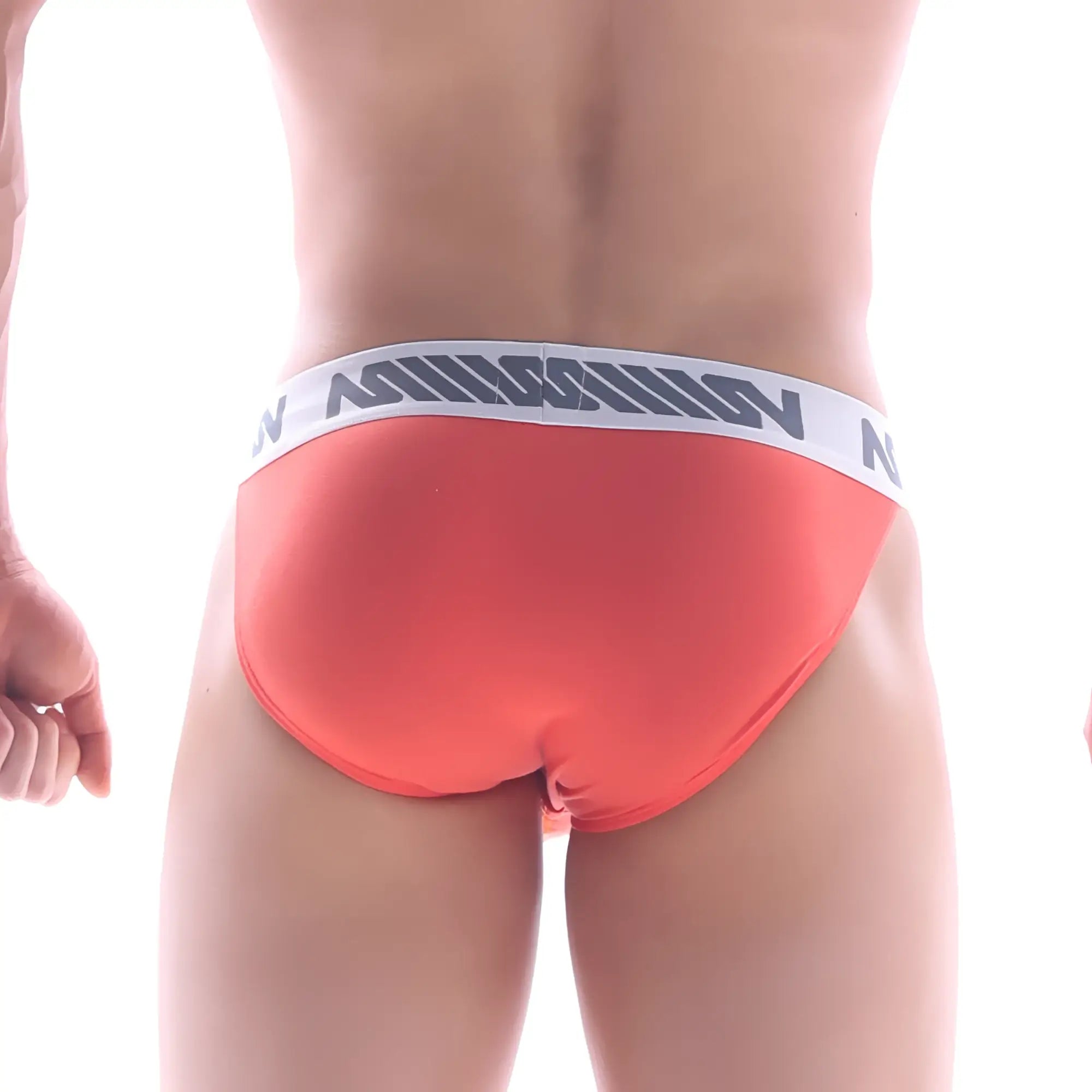 Orange briefs with white waistband featuring black lettering metro male wear grabit bikini orange 3105-14