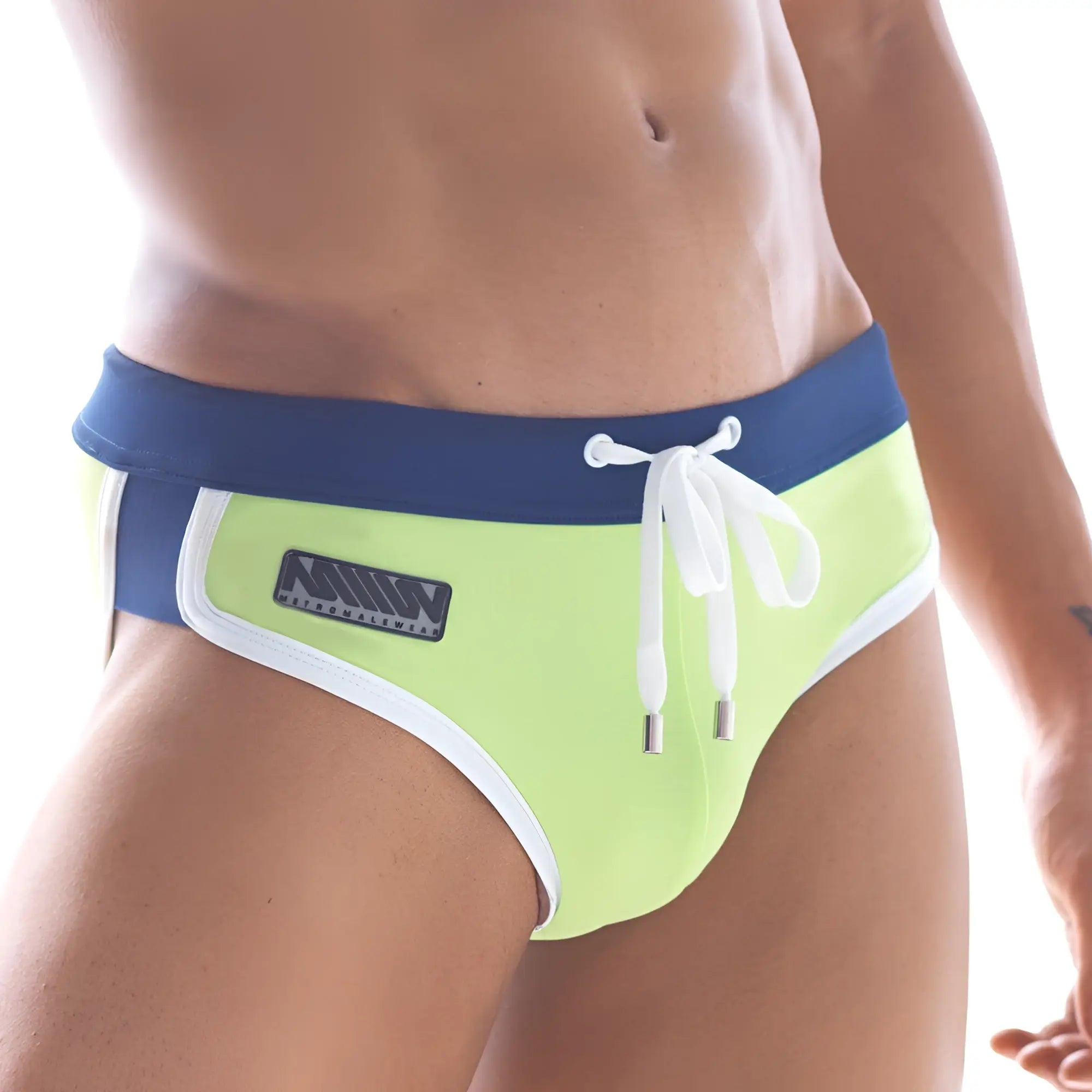 MetroMaleWear green split swim brief with bright lime swim trunks navy waistband white trim and branded side patch