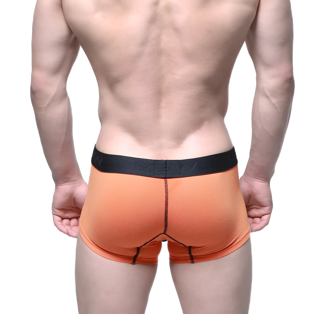 Orange men’s briefs metro malewear halloween short boxer with black waistband mean brand name in white lettering