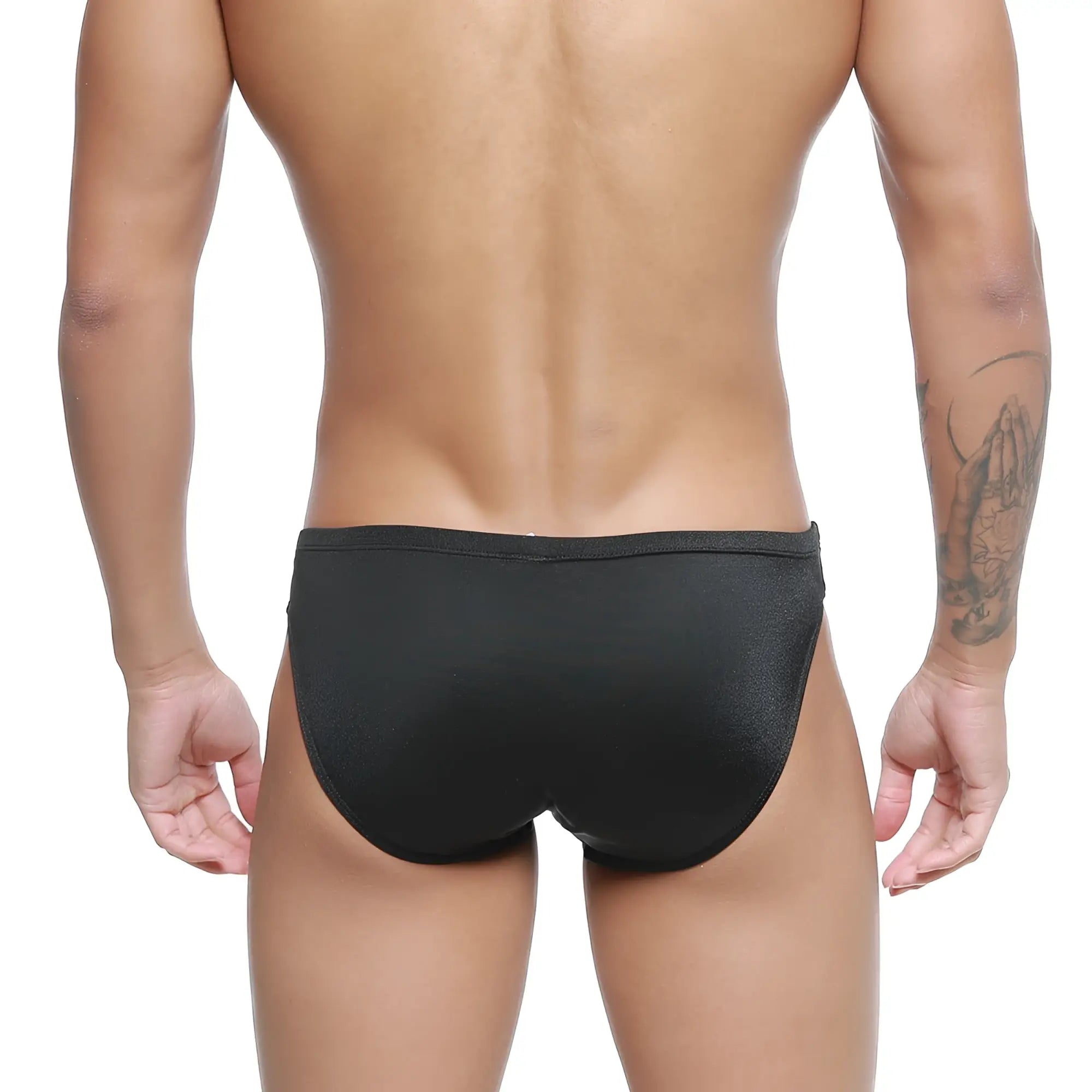 Black sleek MetroMaleWear Hunter swim brief 4977-20 with subtle textured pattern ideal for swimming and beachwear