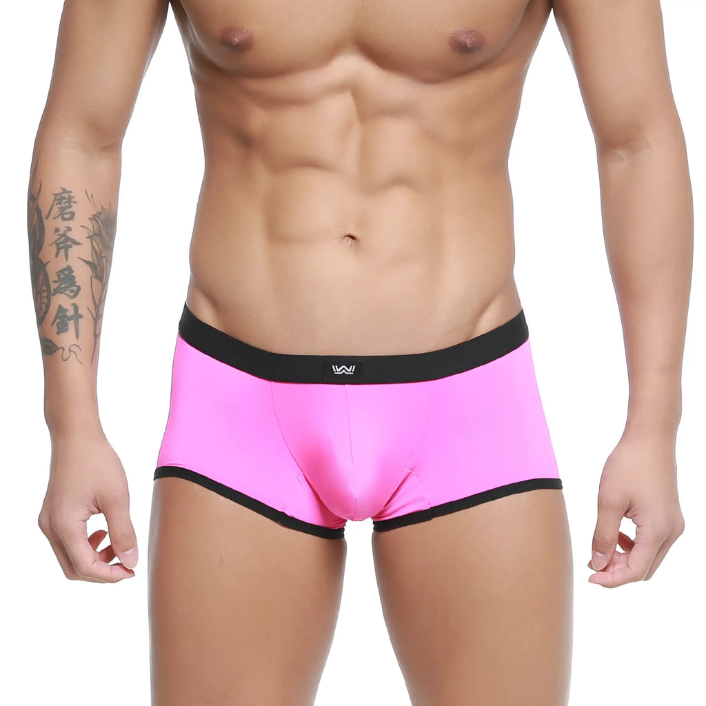 Bright pink mens briefs with black elastic waistband and trim metro malewear iberico trunk magenta 2127 02