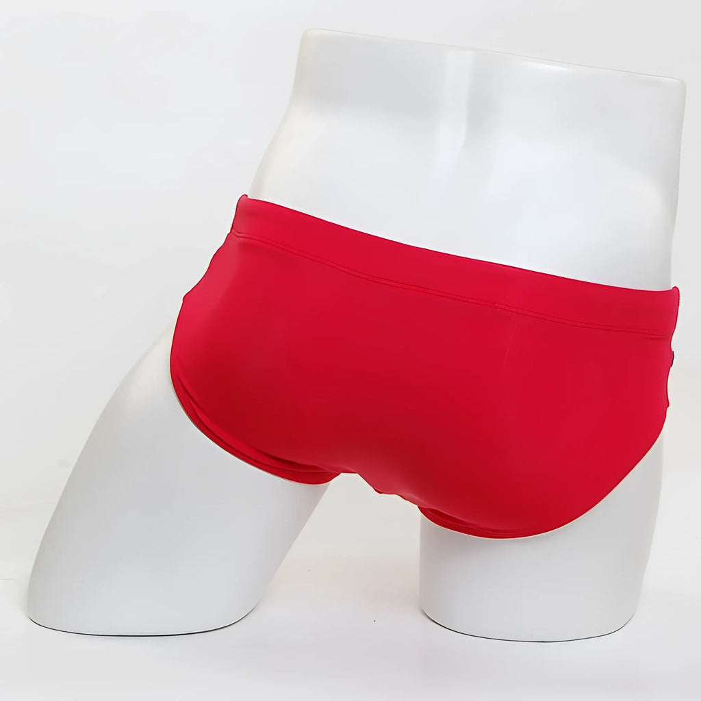 Bright red MetroMaleWear Ibiza swim brief 4928-12 made of lightweight fabric displayed on mannequin front view
