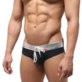Black MetroMaleWear Ibiza swim brief with silver metallic waistband and white drawstring in front view