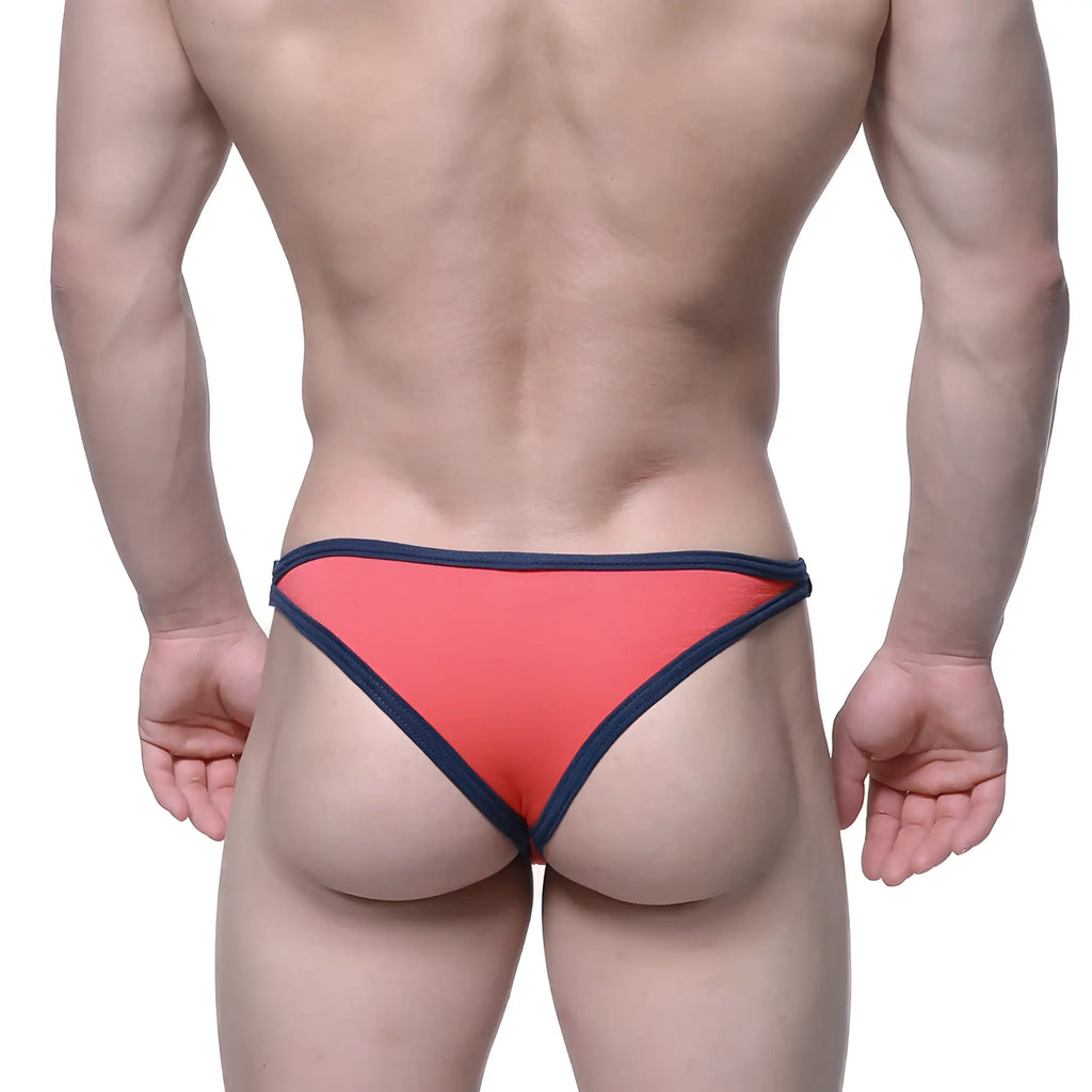 Coral-colored briefs with navy blue trim from metromalewear infinto bikini 6017-14 designed for comfort and style