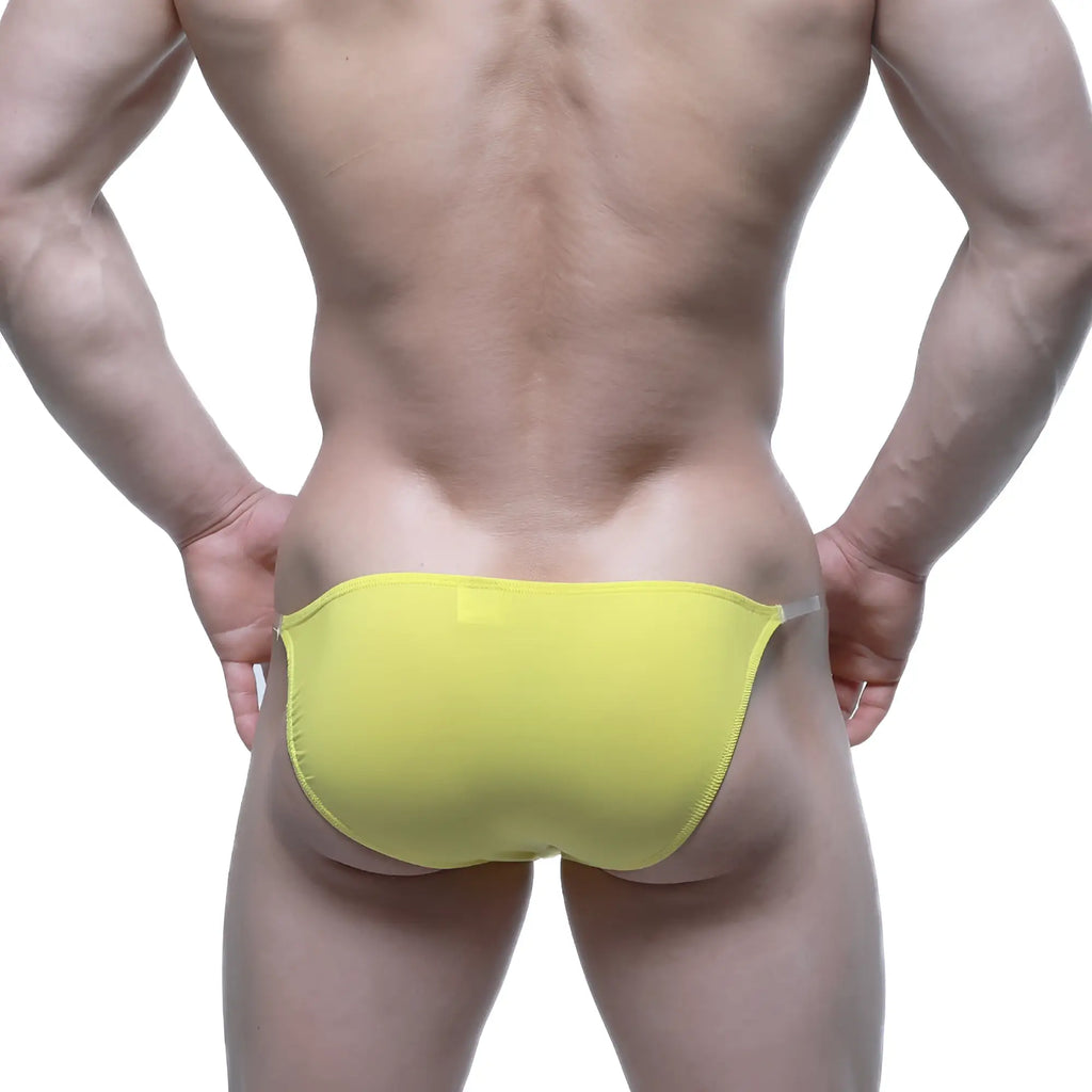 Bright yellow metro malewear invisible bikini swim trunks with sleek minimalist design and form fitting cut