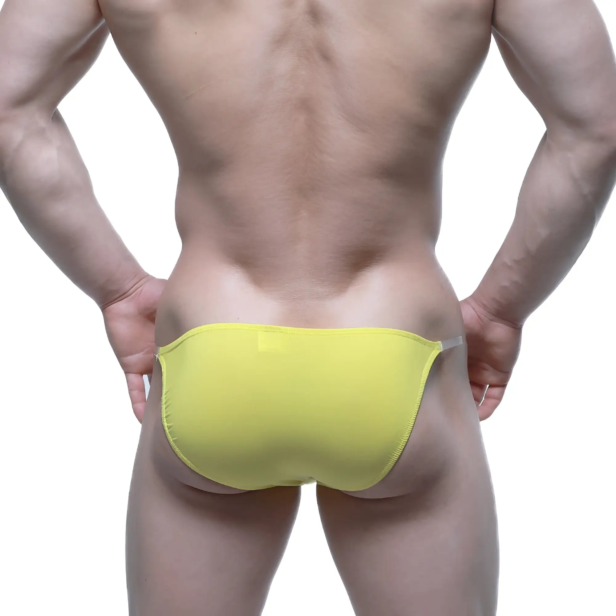 Bright yellow metro malewear invisible bikini swim trunks with sleek minimalist design and form fitting cut