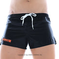Black MetroMaleWear Iron Sports Short 4703-20 swim trunks with white drawstring and orange logo patch on left leg