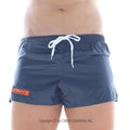 Navy blue MetroMaleWear Iron Sports Short 4703-28 swim trunks with white drawstring and orange logo patch