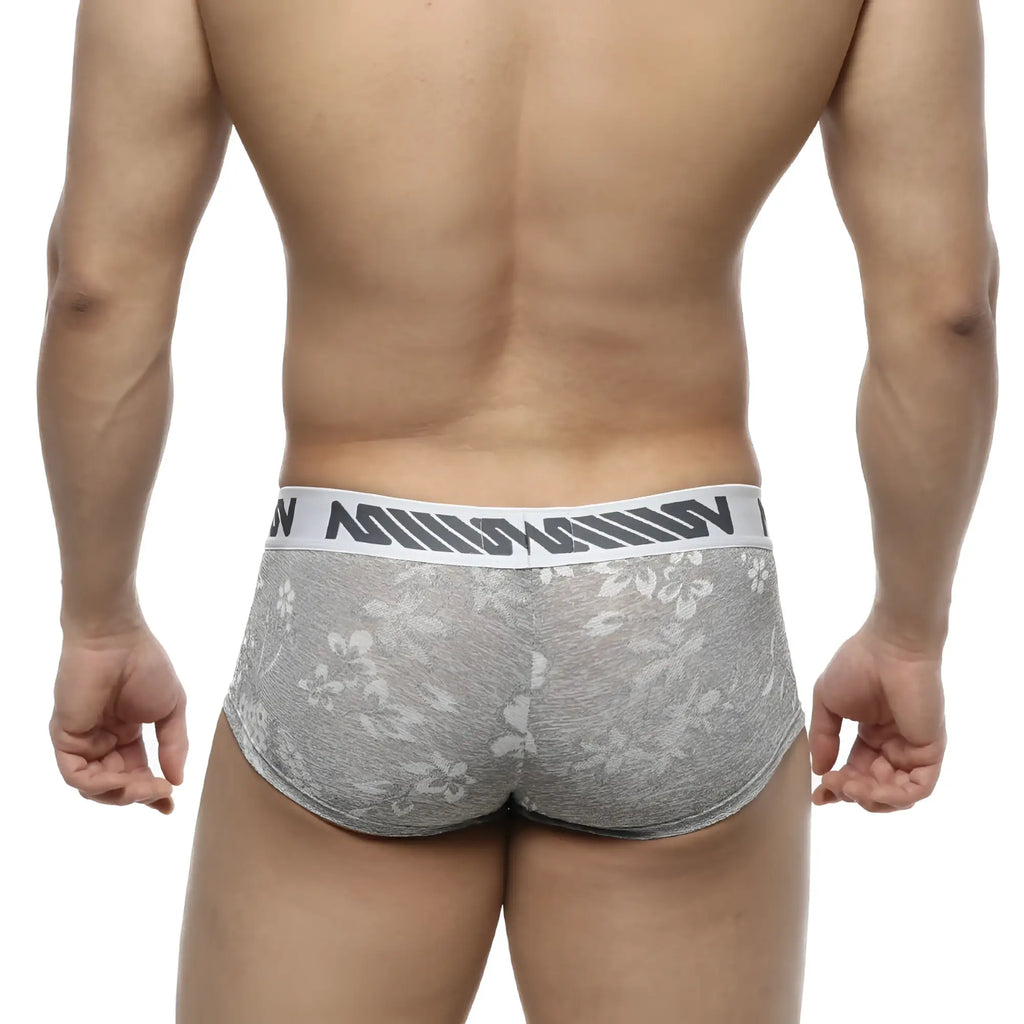 Gray lace briefs with a white waistband featuring black lettering from MetroMaleWear Jacquard Trunk 2026-11