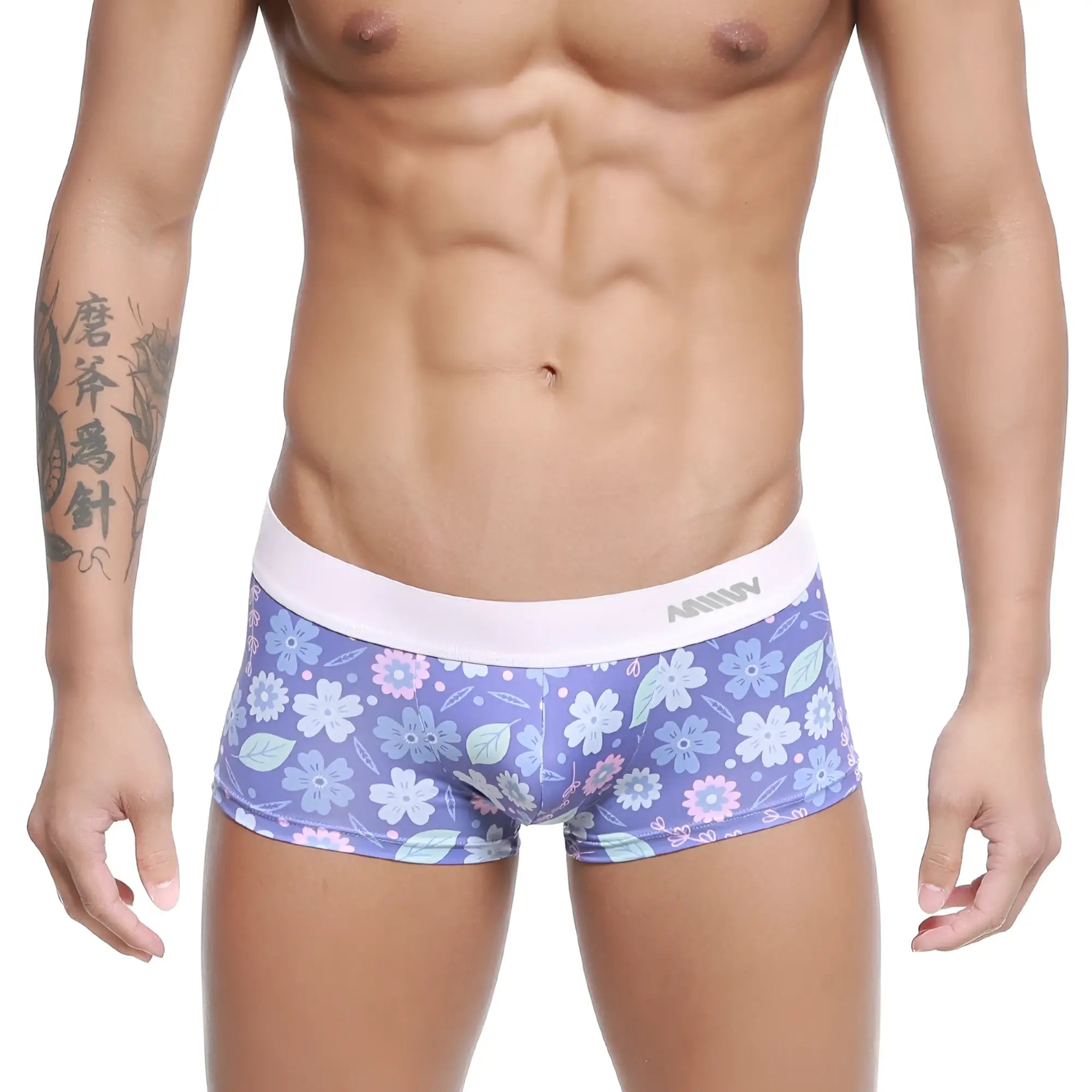 Purple floral-patterned men’s briefs with white elastic amin waistband from MetroMaleWear Jardin Trunk 2026-15