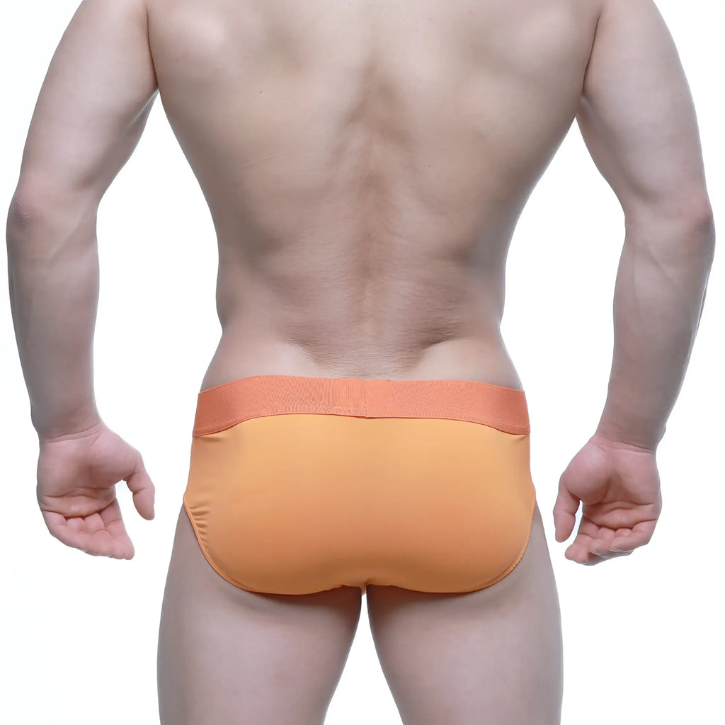 Orange athletic briefs metro malewear jugo brief 5203-14 with matching elastic waistband for active wear