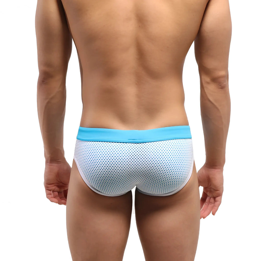 MetroMaleWear layered swim brief in turquoise featuring light blue and white mesh trunks with solid turquoise waistband