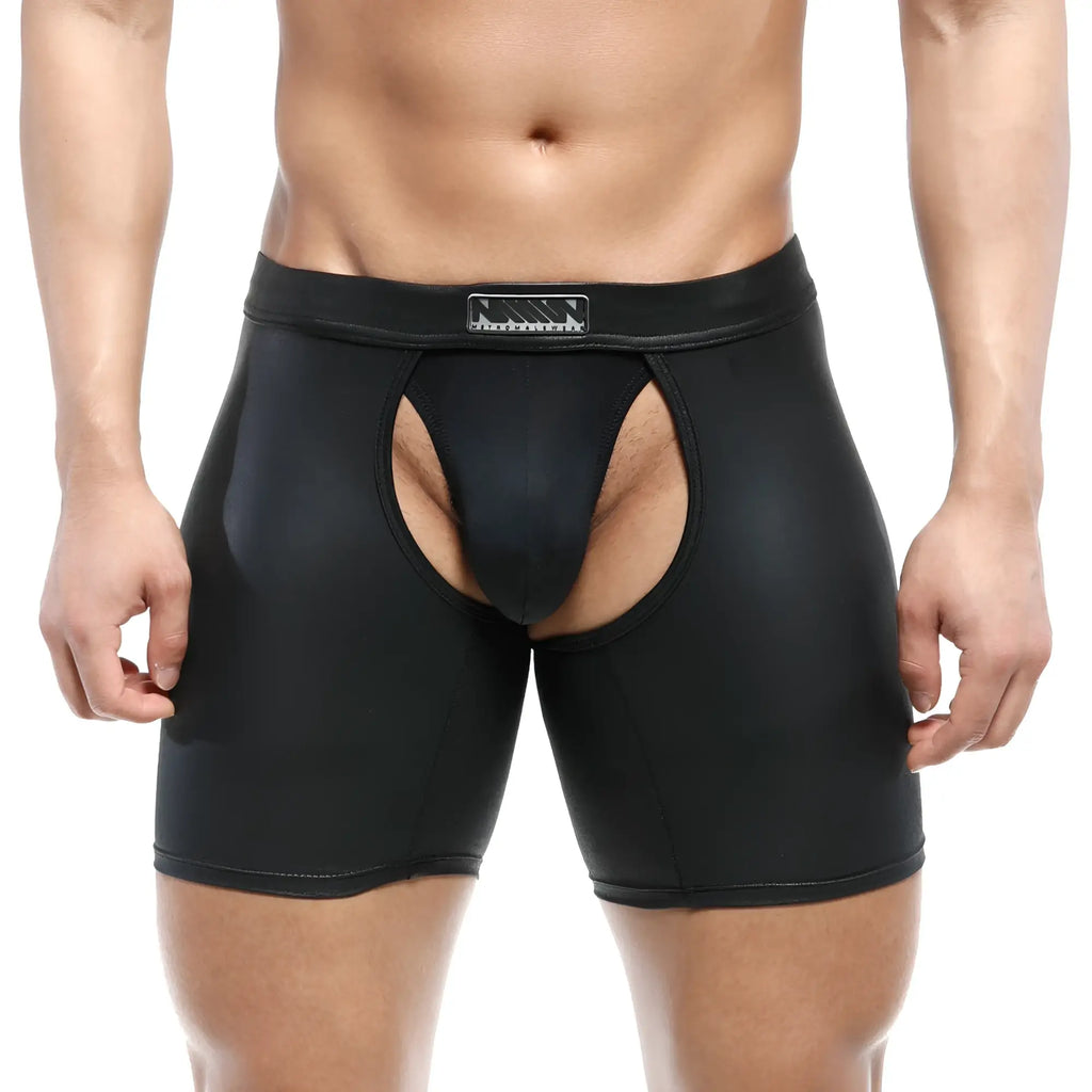 Black glossy faux leather briefs with central cutout and rectangular logo patch on waistband metroMalewear leather chaps 0011