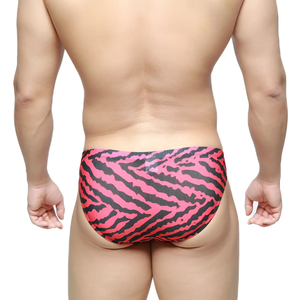 MetroMalewear swim trunks with bright pink and black zebra stripes designed for stylish beachwear