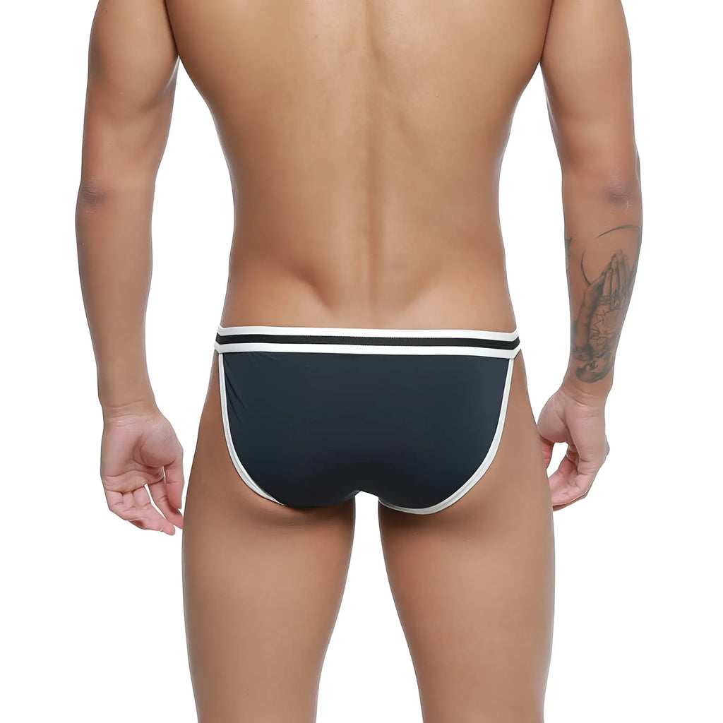 Black swim trunks with white trim featuring a sleek modern design from metromalewear link bikini dark blue 3605-28