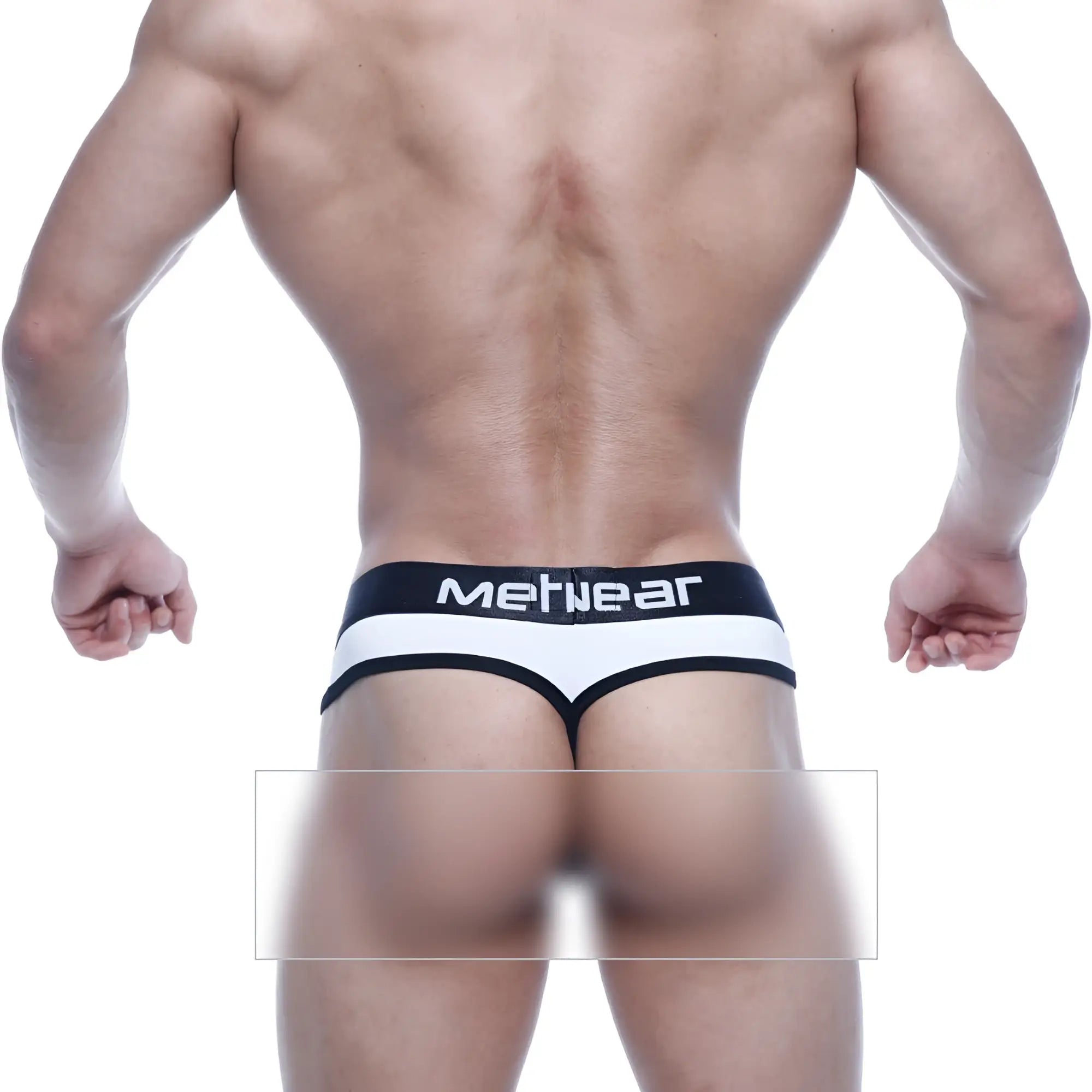 Black and white metro malewear loreto g-string with mefnear branded waistband shown from back side