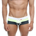 Metro male wear lycos swim trunk white 4938-00 with white waistband lime green and black stripes and white drawstring ties