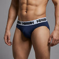 Navy blue MetroMaleWear M25 hip briefs with white elastic waistband and black million branding in front view