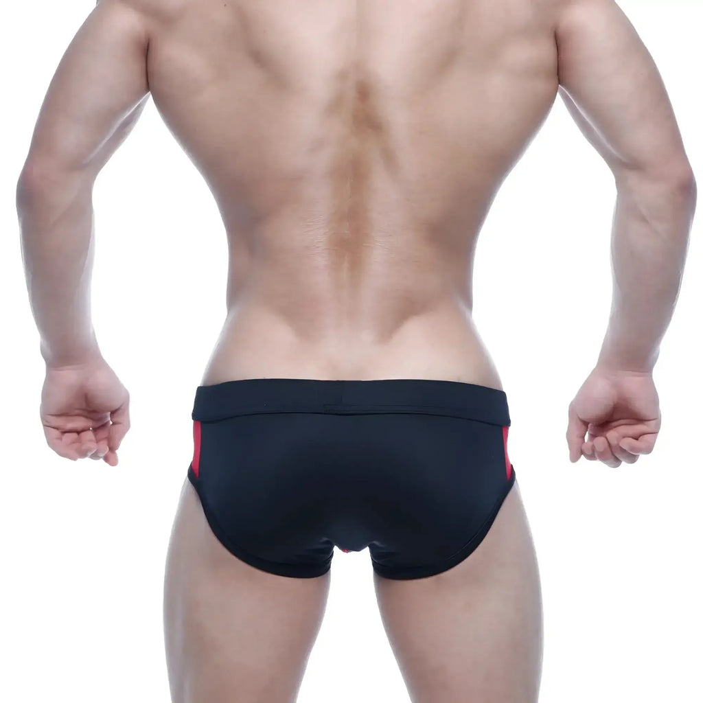 MetroMaleWear Alonzo swim brief in black with red side panels designed for comfortable swimming and beachwear