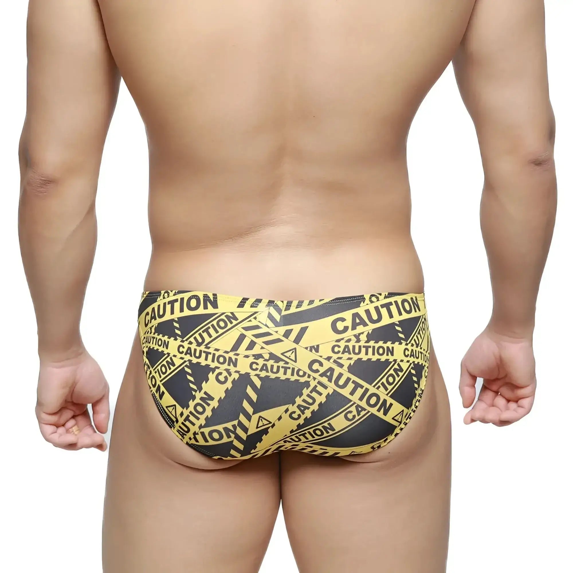 MetroMalewear caution lowrise bikini swim trunks in yellow and black caution tape pattern for bold swimwear style