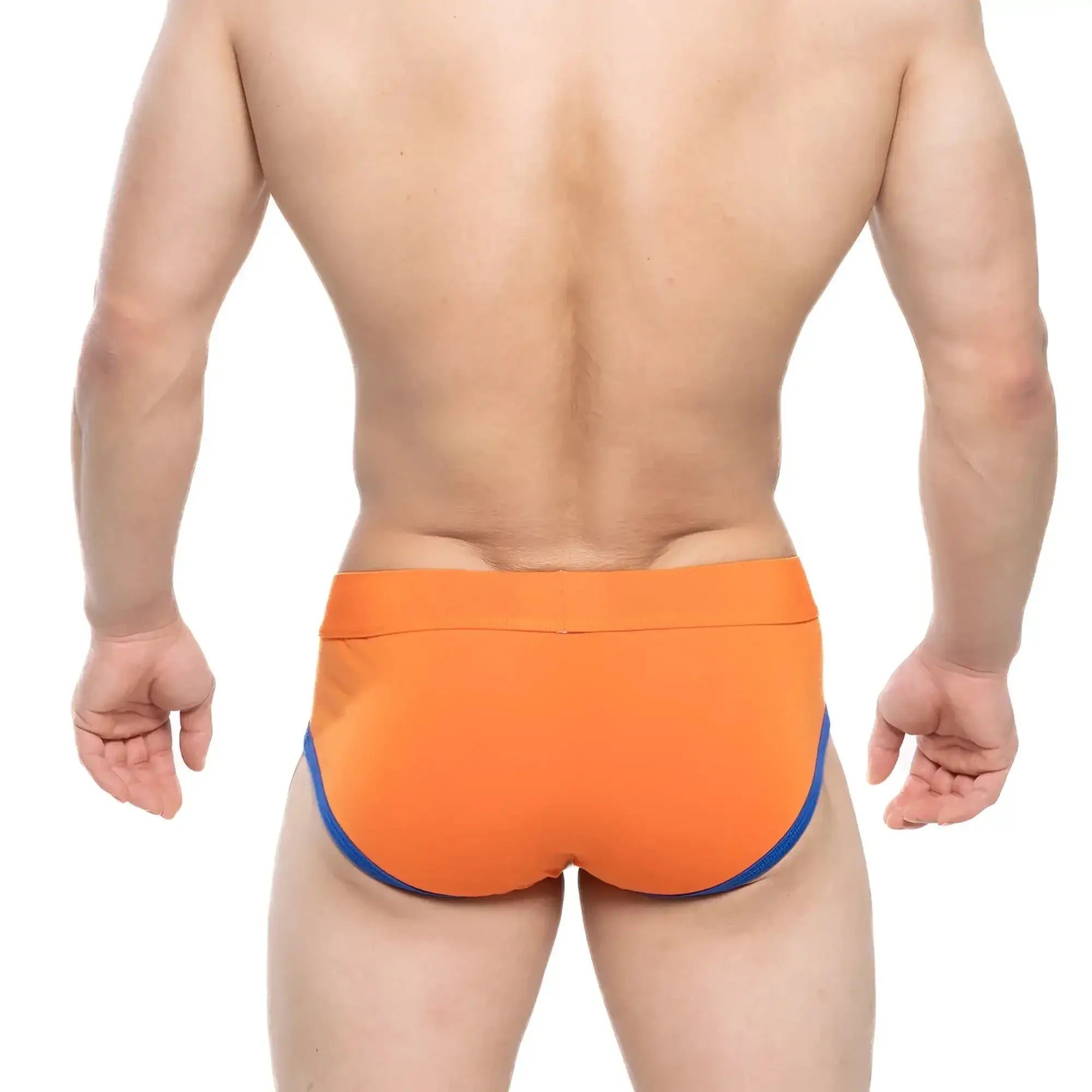 Bright orange MetroMaleWear Ciclerut brief 9004-24 swim trunks with contrasting blue trim along the sides