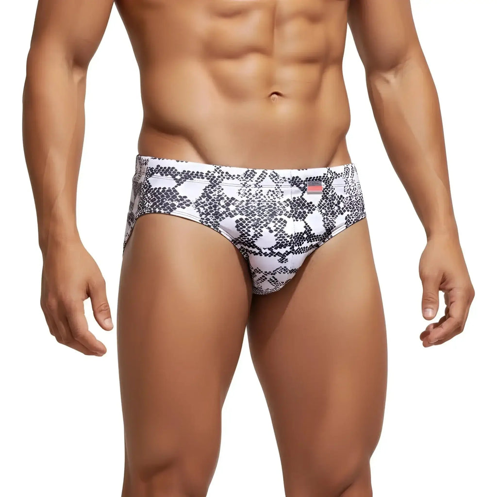 White swim trunks with black snake-scale pattern from metro male wear classic swim brief 4964-60 collection