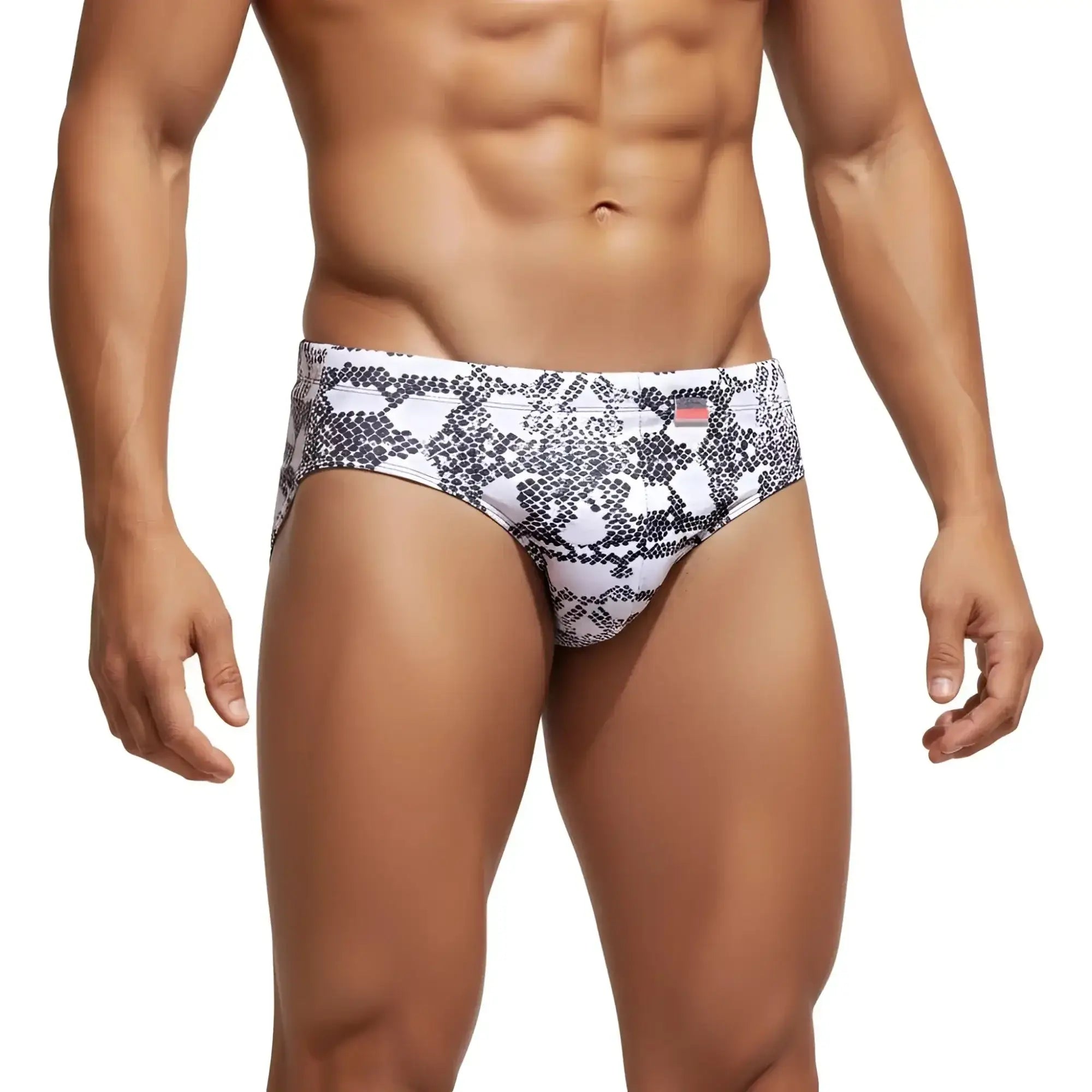 White swim trunks with black snake-scale pattern from metro male wear classic swim brief 4964-60 collection
