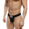 Black men’s briefs by MetroMaleWear Deseo thong black 3312-20 with a white logo patch on the waistband
