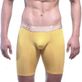 Yellow men’s compression briefs with light beige elastic waistband featuring metromale wear logo goldmine long short 15 inch