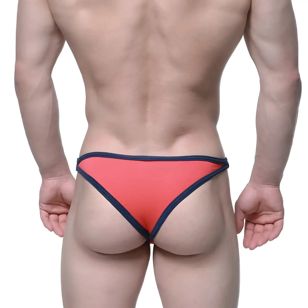 Coral-colored briefs with navy blue trim from metromalewear infinto bikini 6017-14 designed for comfort and style