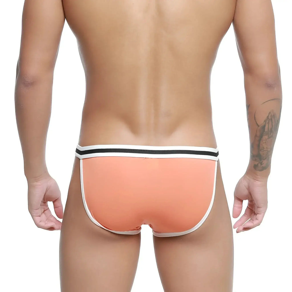 Coral-colored metro male wear link bikini briefs with white and black striped waistband in orange 3605-14 design