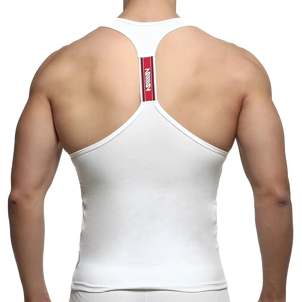 Back view of metroMalewear white racerback tank top with red vertical stripe and mann logo in white lettering
