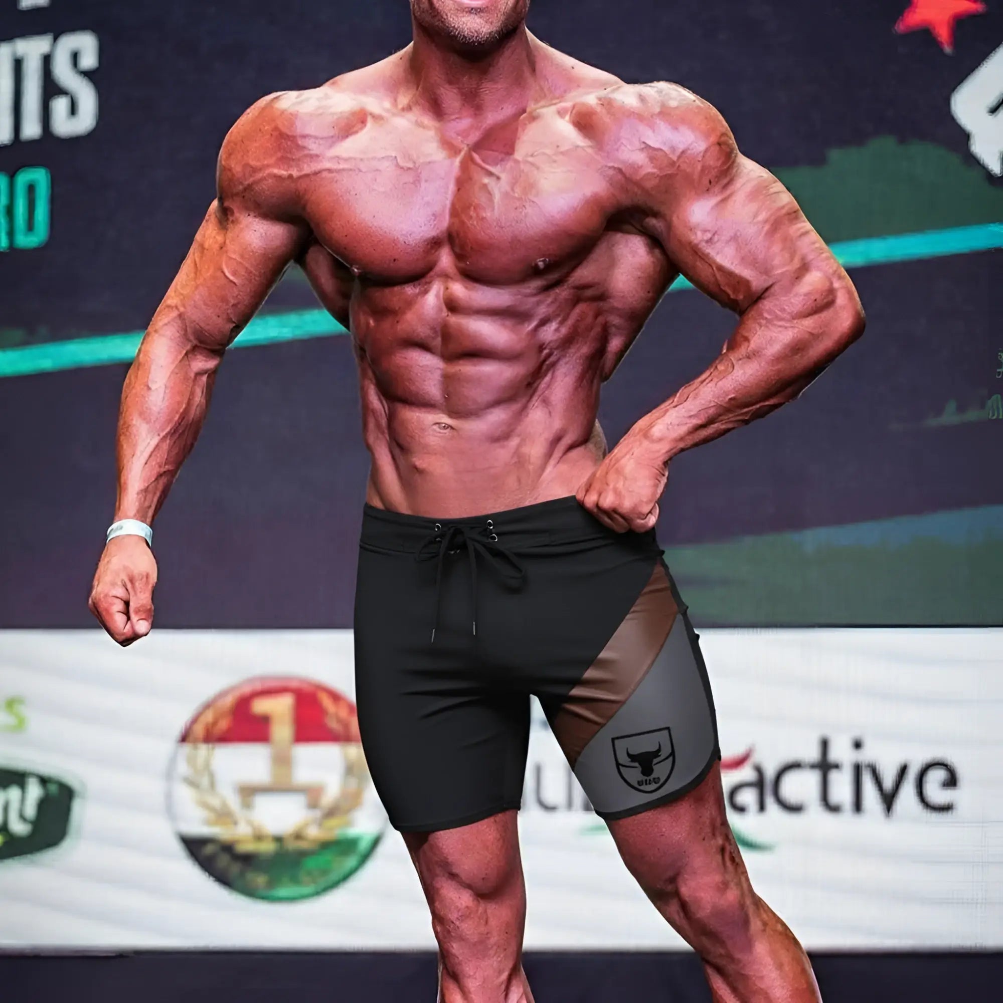 Black and gray MetroMaleWear MetroMuscleWear cafe physique board shorts with bold bull logo on the side