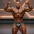 Shiny silver metallic briefs with decorative buckle and belt detail metroMalewear MetroMuscleWear competition suit platinum