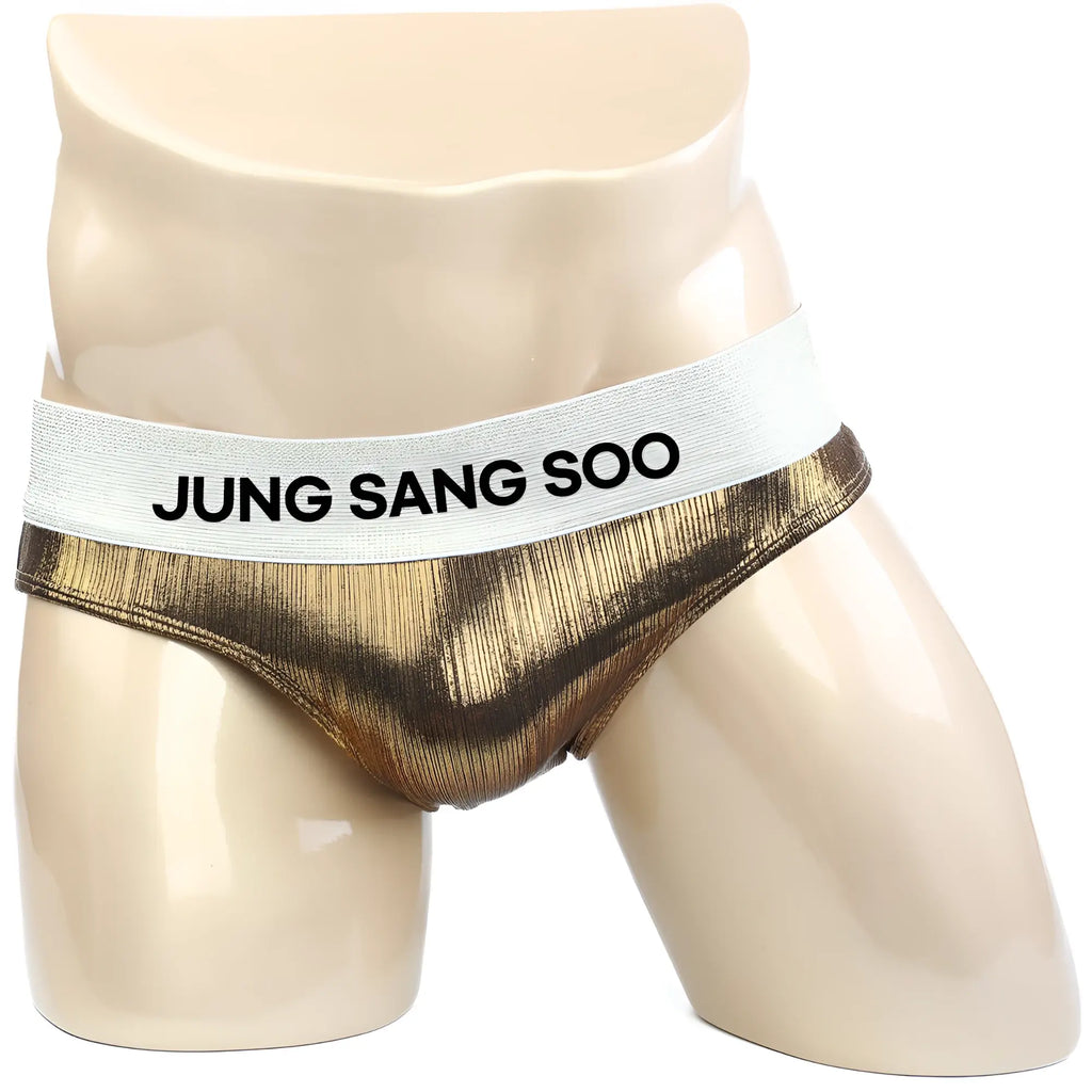 Gold metallic textured briefs with white elastic waistband featuring black jung sang soo text metro musclewear diy suit