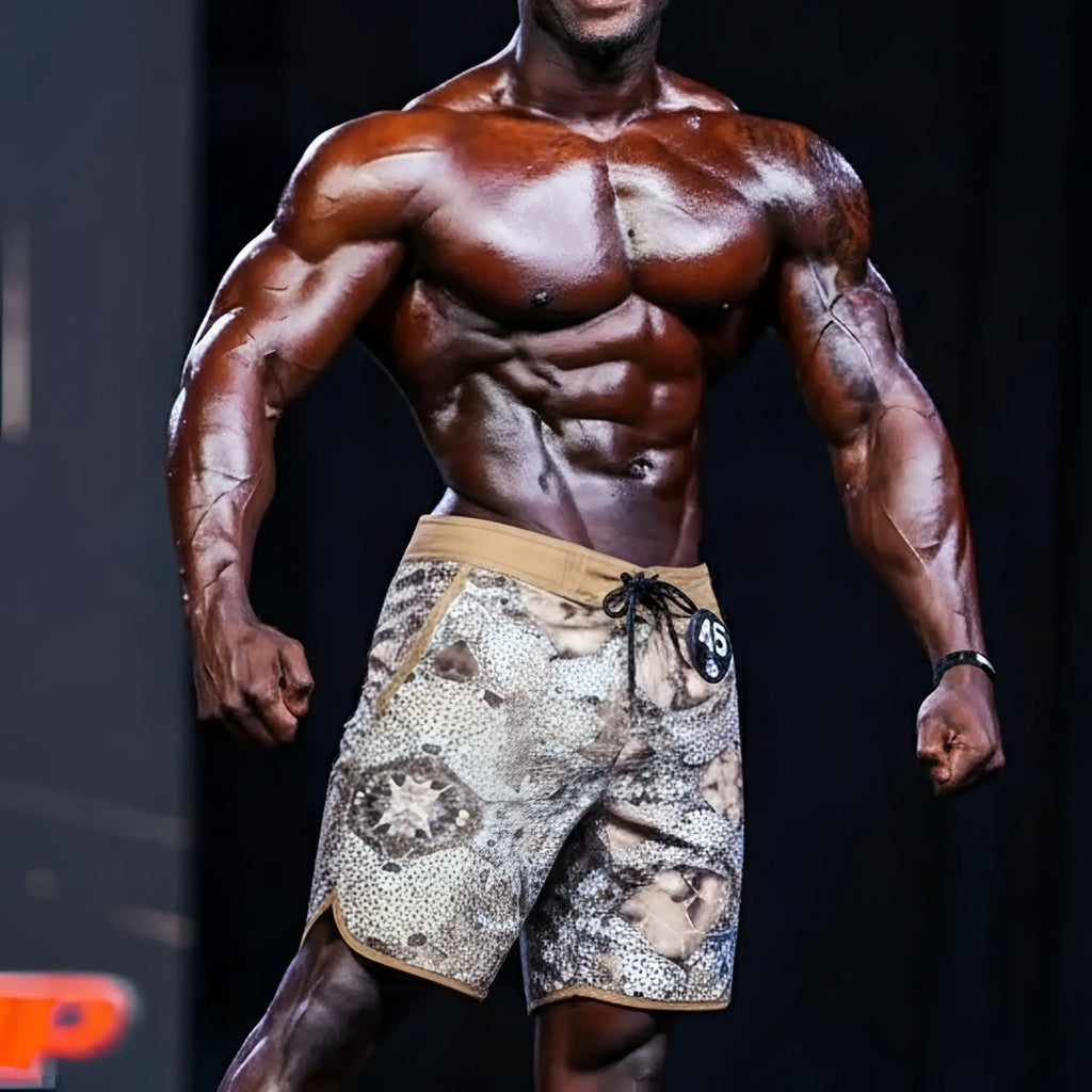 MetroMaleWear MetroMuscleWear honeycomb physique board shorts camo pattern tan trim black number 45 badge on waistband