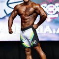 Metro malewear ifbb pro mens physique board shorts in black white and green with bold diagonal stripes and shield logo